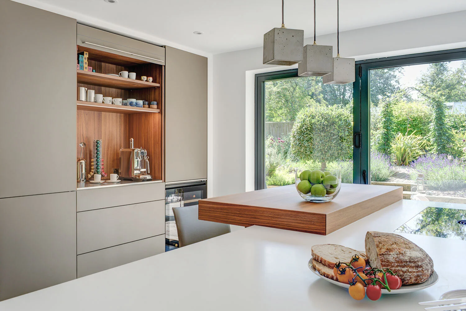 bulthaup-b3-kitchen-flint-tall-units-with-pocket-door-roller-shutter-1