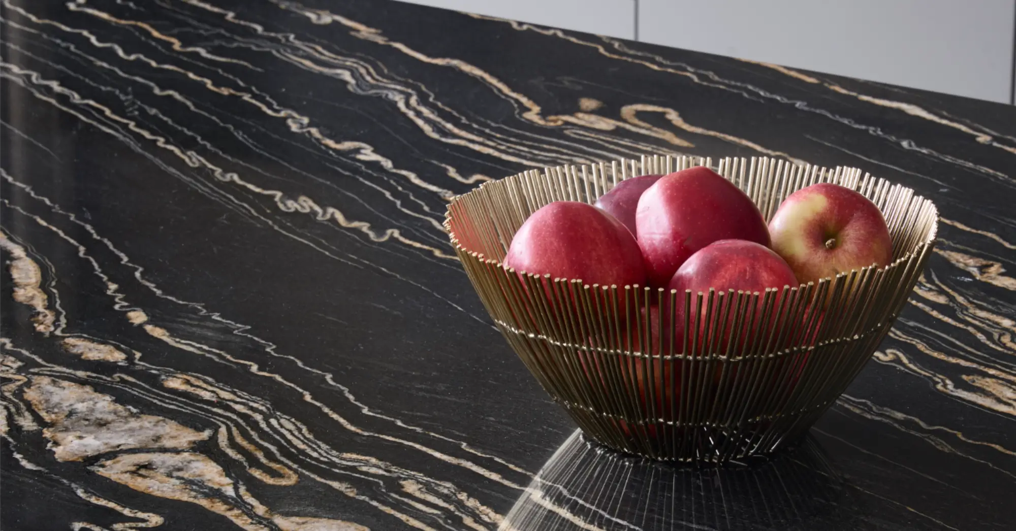 Fruit bowl on granite kitchen island worktop