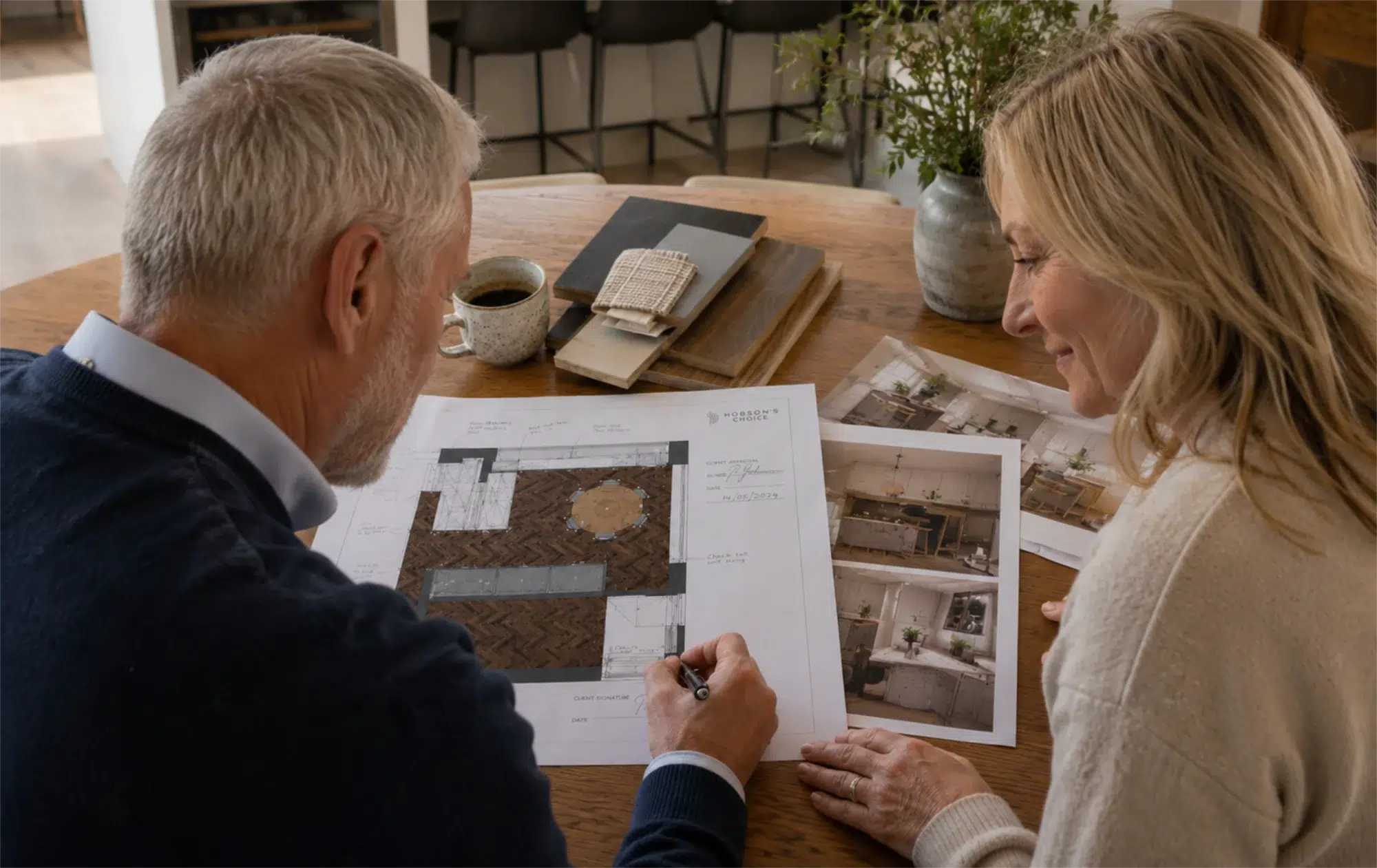 Couple signing off kitchen design