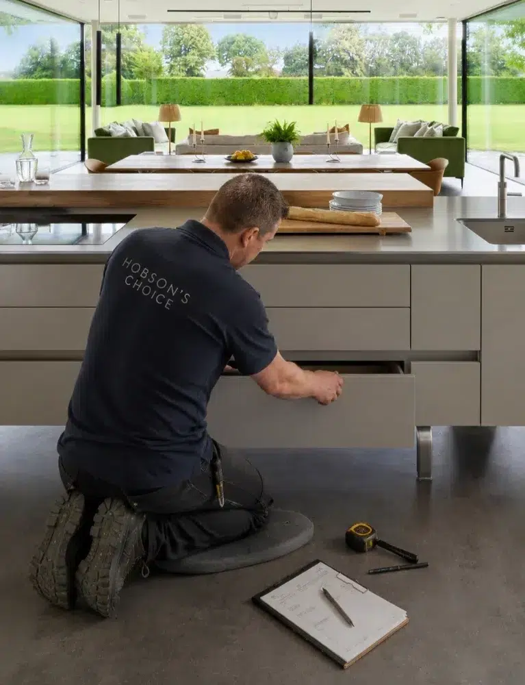 Hobson’s Choice team member supporting a client with aftercare following installation