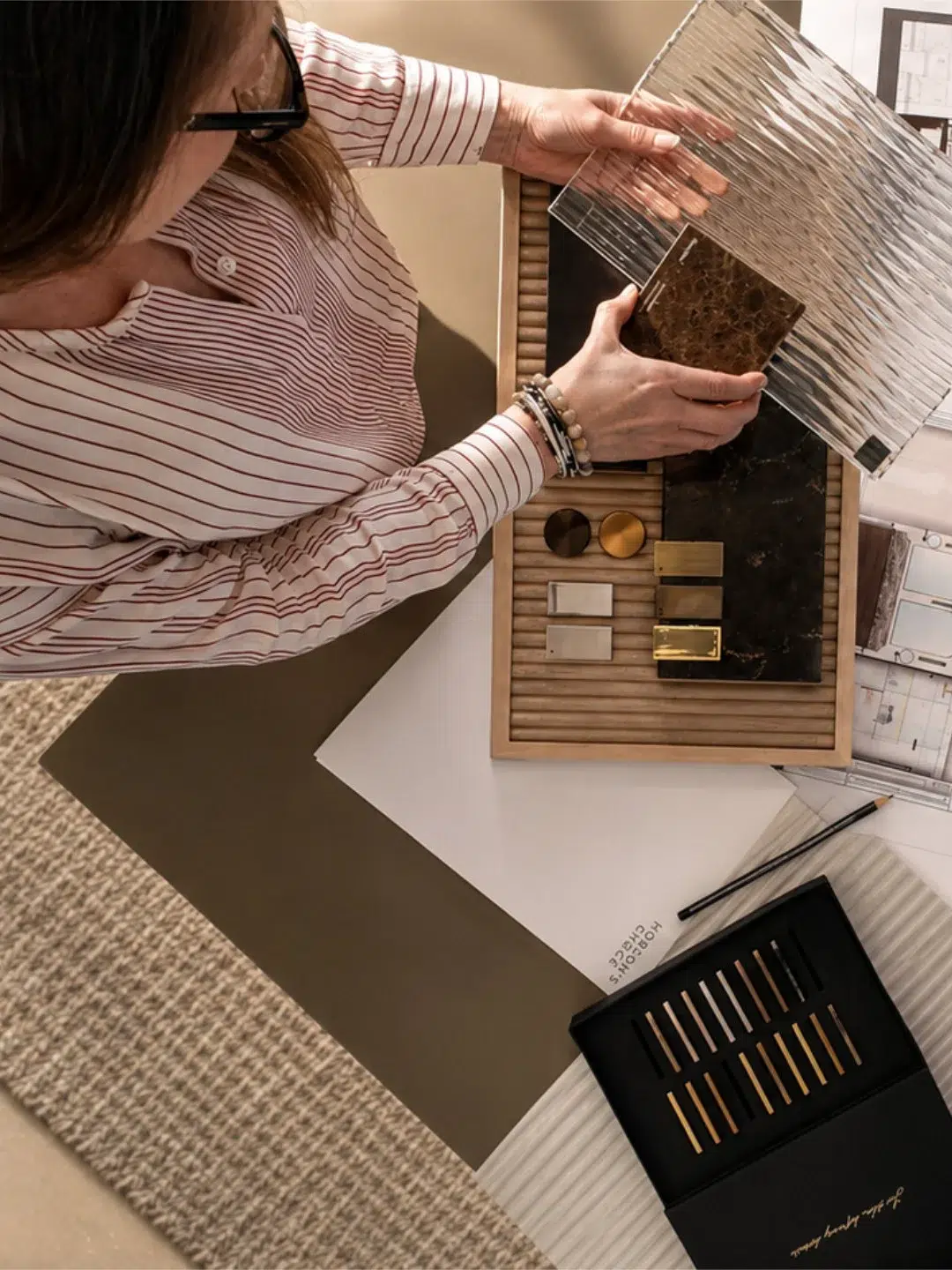Hobson’s Choice designer arranging material and finish samples