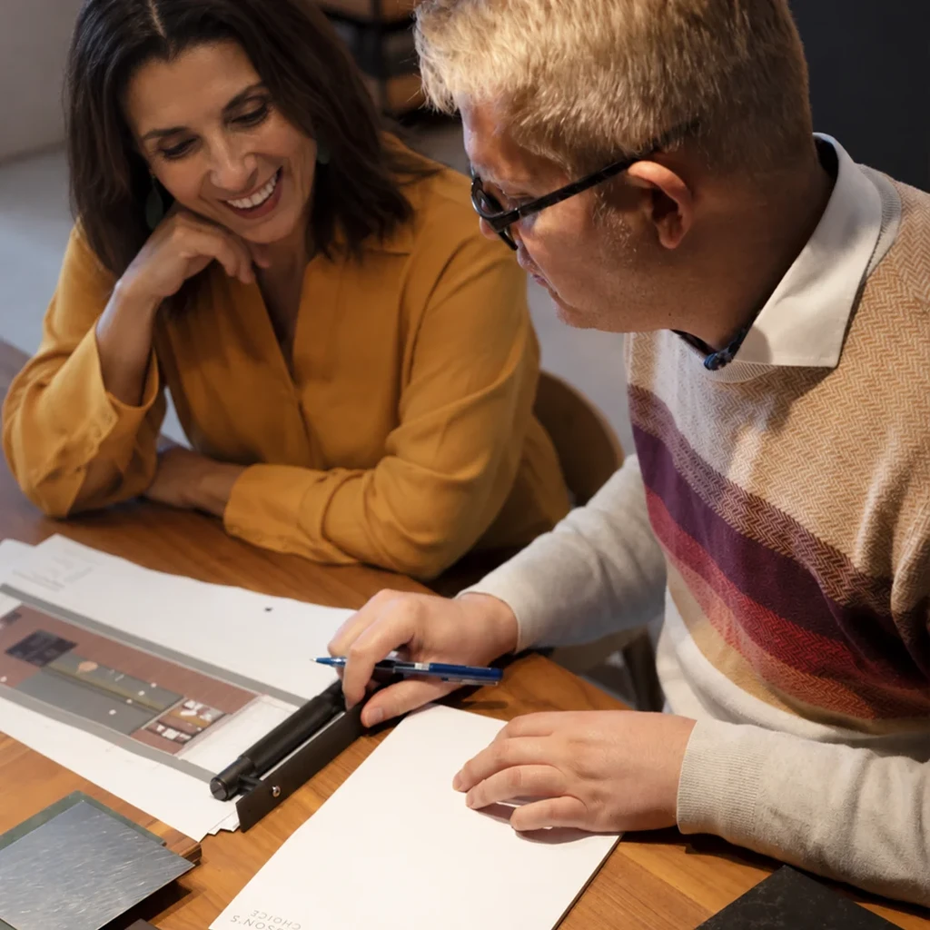 Kitchen Designer Discussing Plans