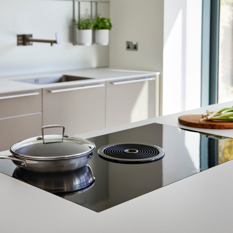 BORA induction cooktop with integrated downdraft in a bulthaup kitchen