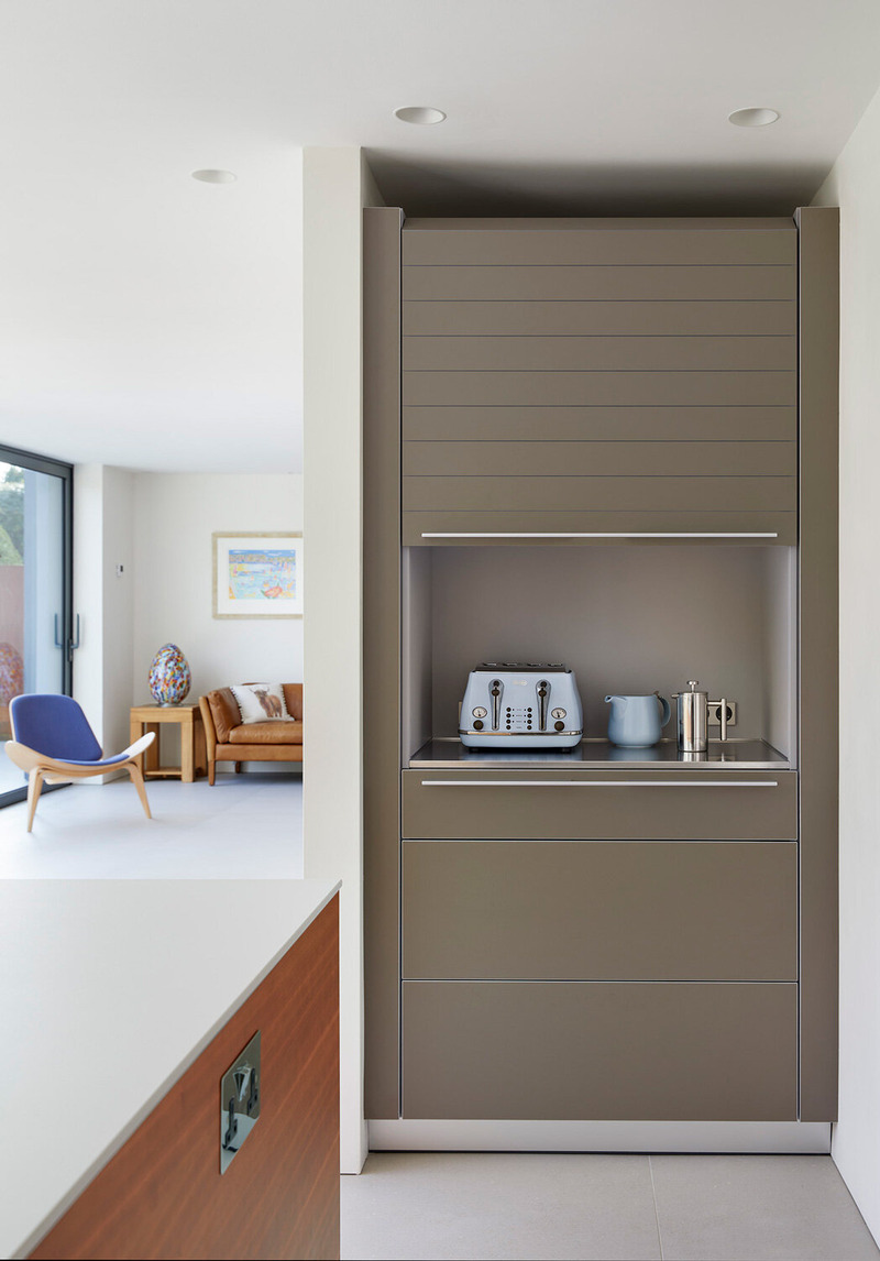 bulthaup b3 kitchen storage unit with a roller shutter garage