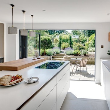 white kitchen wood breakfast bar garden