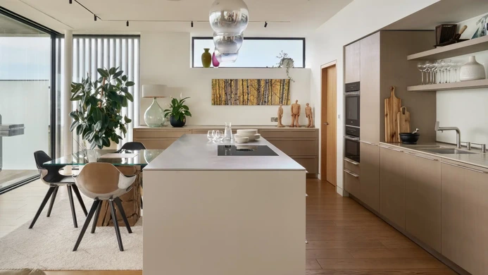 Grey Oak kitchen with Gravel island and minimalist open-plan layout