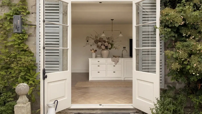 Garden-facing Georgian kitchen with sink positioned for outdoor views