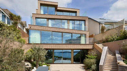 Contemporary Sandbanks waterfront home with floor-to-ceiling glazing