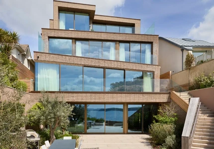 Contemporary Sandbanks waterfront home with floor-to-ceiling glazing