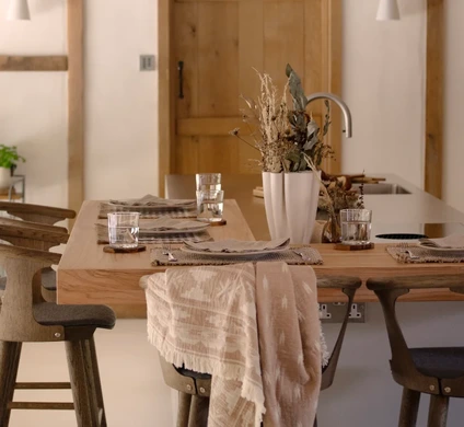 Kitchen island dressed for casual dinner in a barn conversion