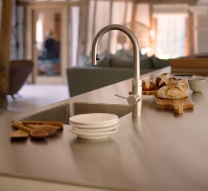 Quooker Flex tap fitted into stainless steel bulthaup worktop
