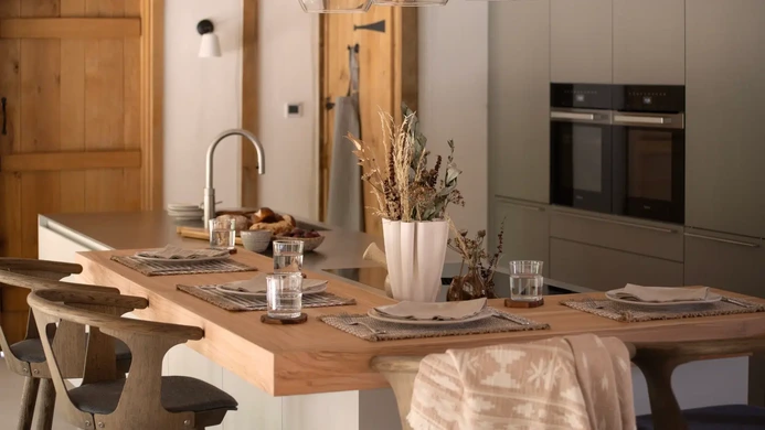 Contemporary barn kitchen with natural timber, stainless steel and soft grey cabinetry