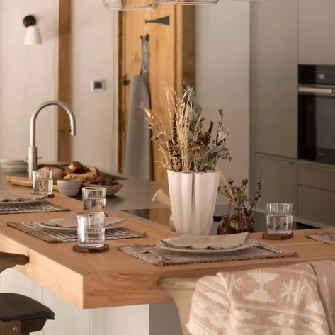 Contemporary barn kitchen with natural timber, stainless steel and soft grey cabinetry