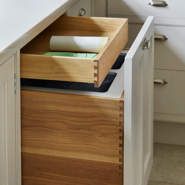 Bespoke timber drawer storage inside a traditional kitchen cabinet