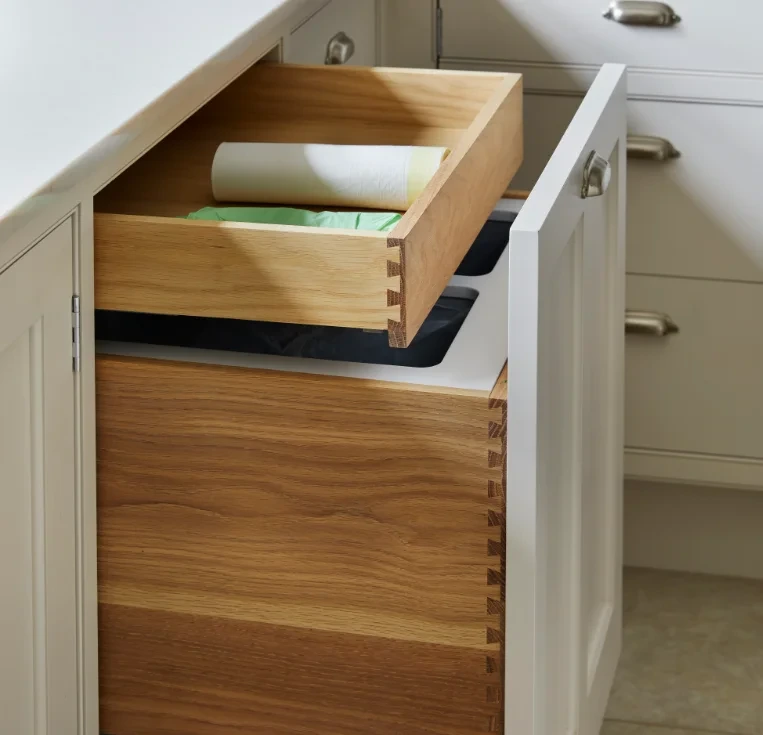 Bespoke timber drawer storage inside a traditional kitchen cabinet