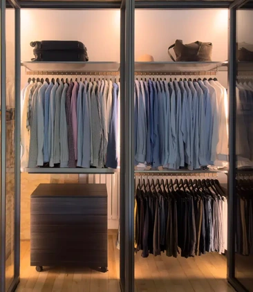 Luxury fitted wardrobe integrated into a characterful barn conversion