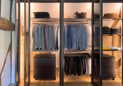 Luxury fitted wardrobe integrated into a characterful barn conversion