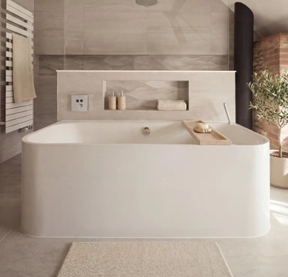 Contemporary bathroom with freestanding bath and neutral stone finishes