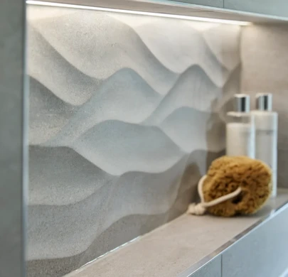 Textured shower wall tiles with built-in shelf
