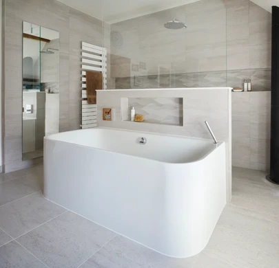 Spacious master ensuite with freestanding bath, double vanity and exposed timber beams