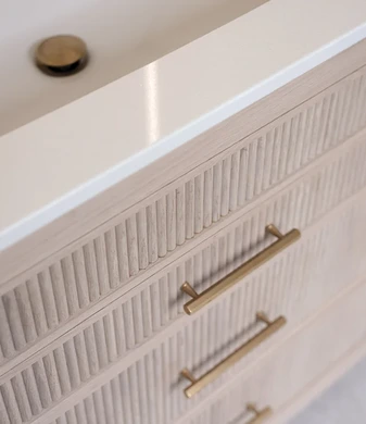 Brass and herringbone ensuite