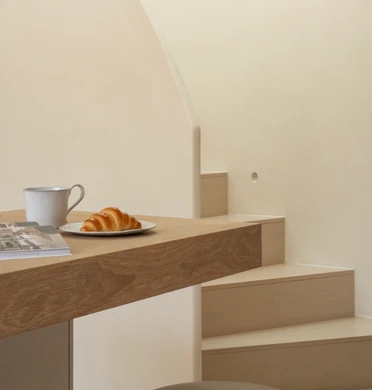 White oak structured breakfast bar in contemporary home