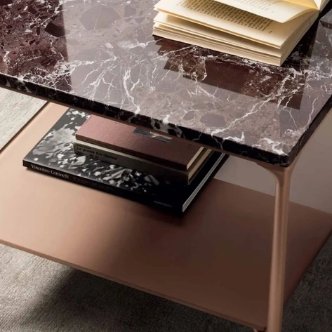 Rimadesio coffee table materials including marble, metal and glass finishes