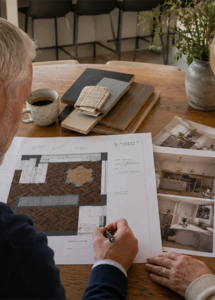 Couple signing off kitchen design