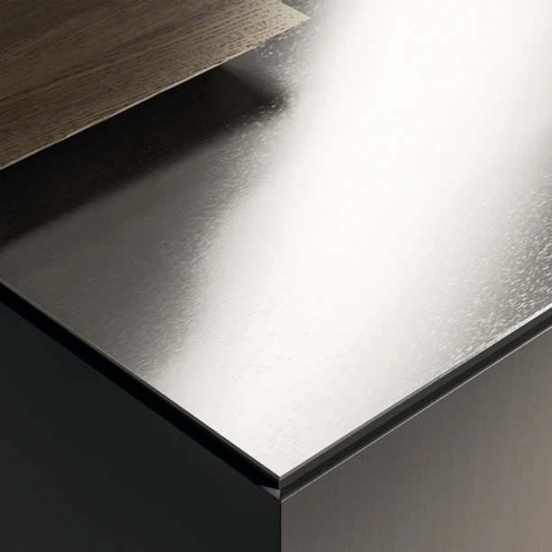 Close-up of a brushed stainless-steel Arrital worktop and mitred edge.