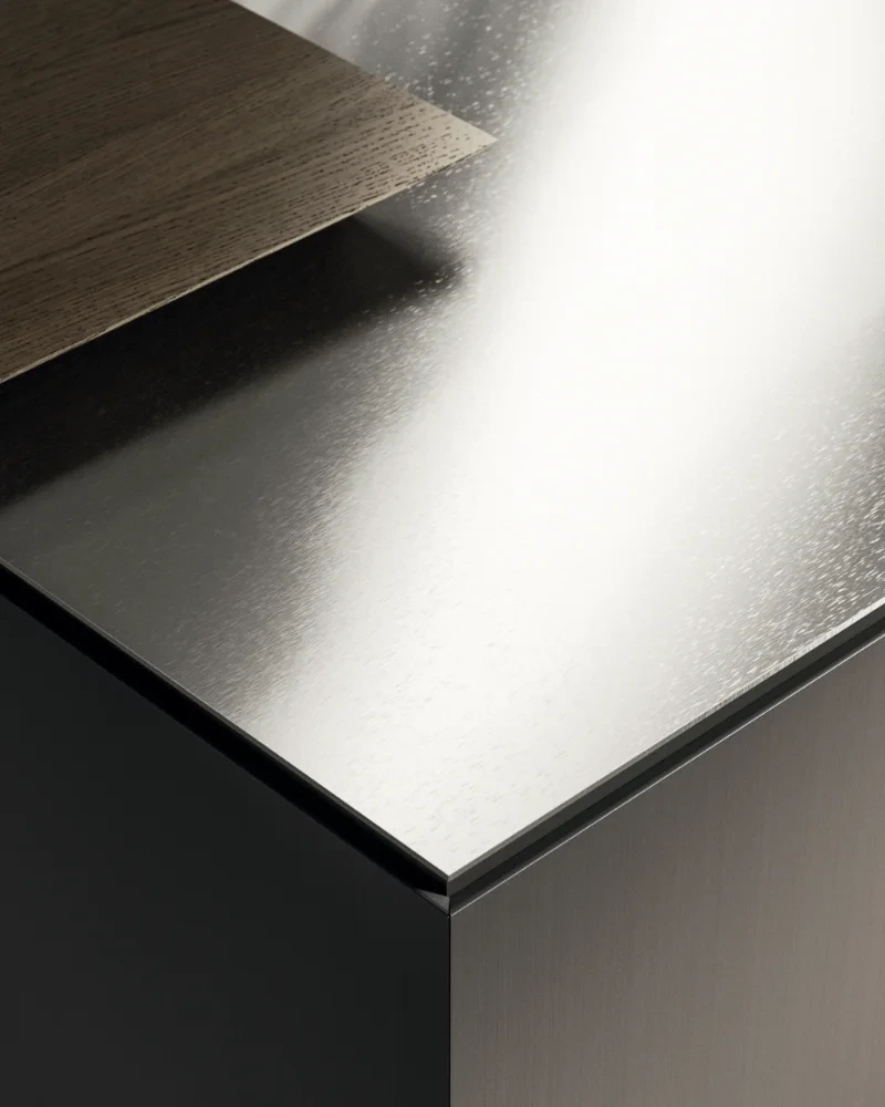Close-up of a brushed stainless-steel Arrital worktop and mitred edge.
