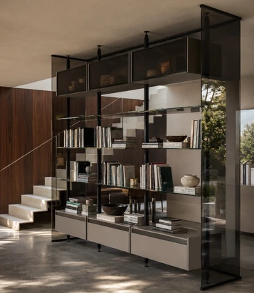 Arrital Living floor-to-ceiling dark open shelving dividing a contemporary living space.