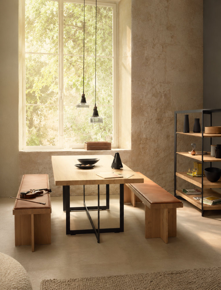 bulthaup b Solitaire dining table and freestanding storage in a contemporary living space