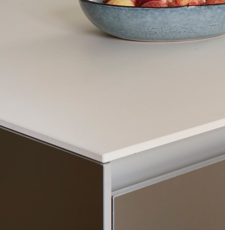 bulthaup b3 kitchen cabinetry in Sand Beige Gold aluminium and Kaolin laminate