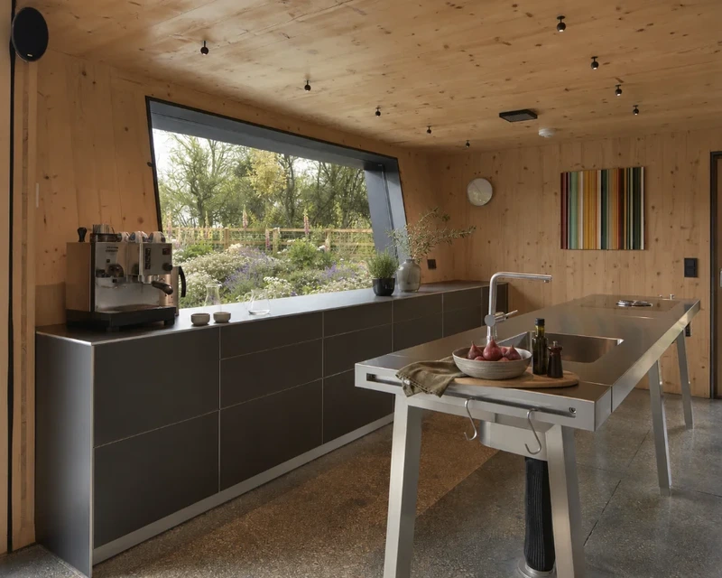 Client kitchen combining a bulthaup b2 workbench with bulthaup b3 cabinetry