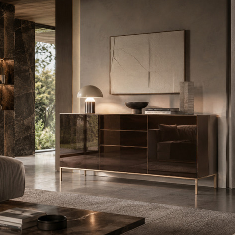 Freestanding Rimadesio Self Up sideboard on slender aluminium feet, shown against a monochrome mural wall.