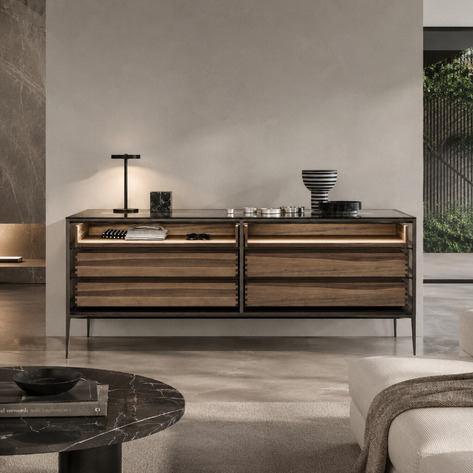 Rimadesio Alambra Isola display sideboard with glass-fronted compartments, bronze-toned drawers and a slim dark frame.