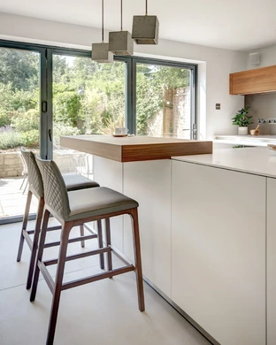Alpine White Kitchen With Walnut Accents 18