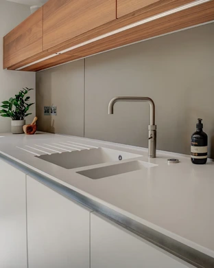 Alpine White Kitchen With Walnut Accents 20