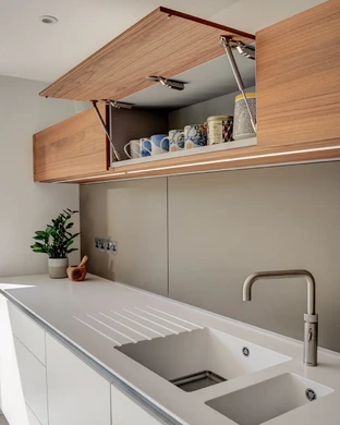 Alpine White Kitchen With Walnut Accents 21