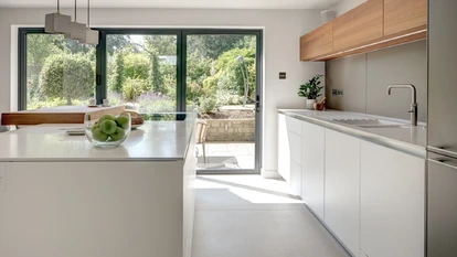 Alpine White Kitchen With Walnut Accents 1