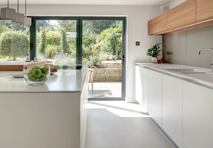 Alpine White Kitchen With Walnut Accents 1