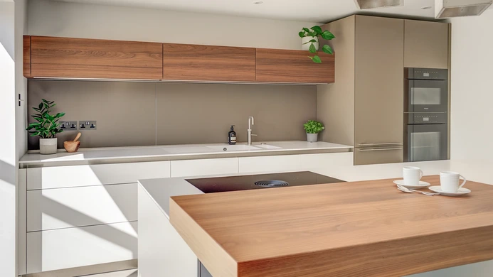 Alpine White Kitchen With Walnut Accents 6