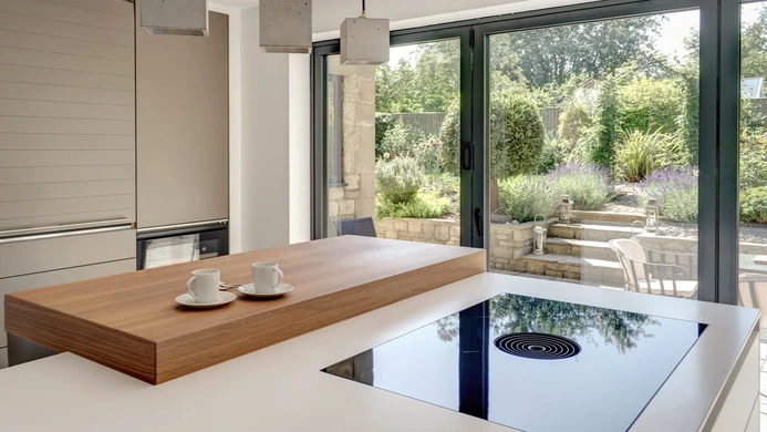 Alpine White Kitchen With Walnut Accents 9