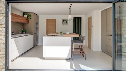 Alpine White Kitchen With Walnut Accents 12