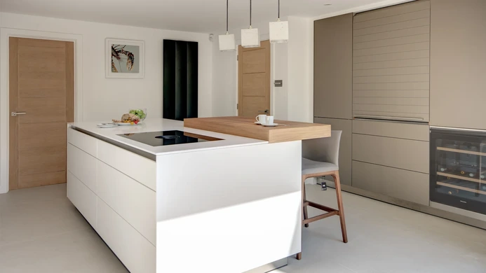 Alpine White Kitchen With Walnut Accents 14