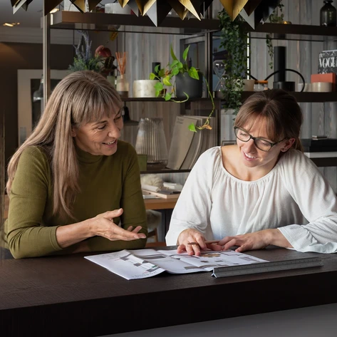 Kitchen Design Talking With Client About Plans